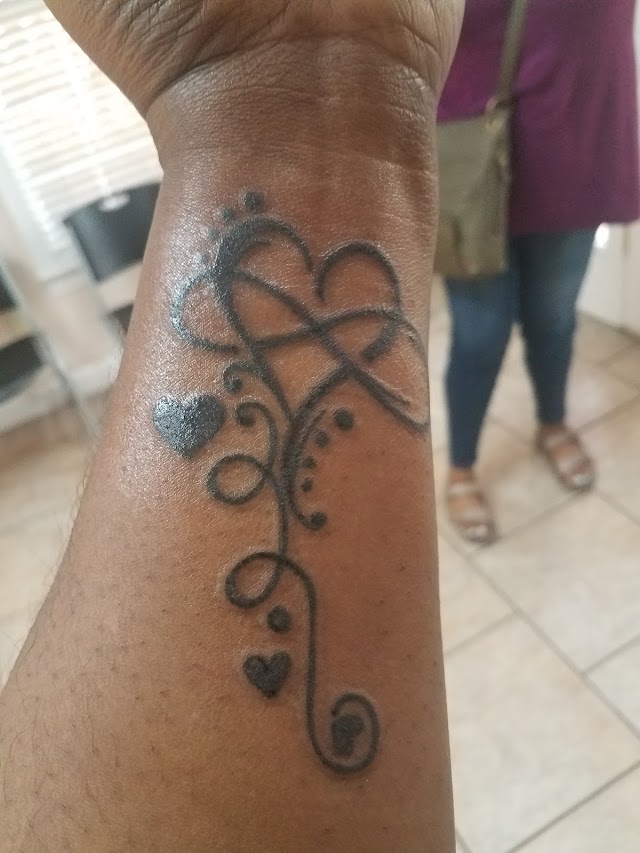 Nevaeh Tattoos photo 3