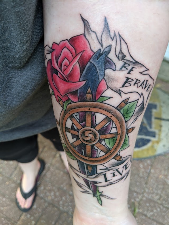 Outlaw Custom Tattoo